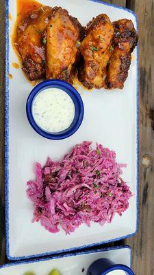 Island chicken wings and Cole slaw , pretty tasty , the wings were good but could use a little heat to it.