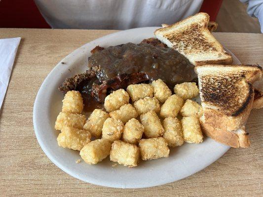 Meatloaf Steak with tater tots and Texas toast