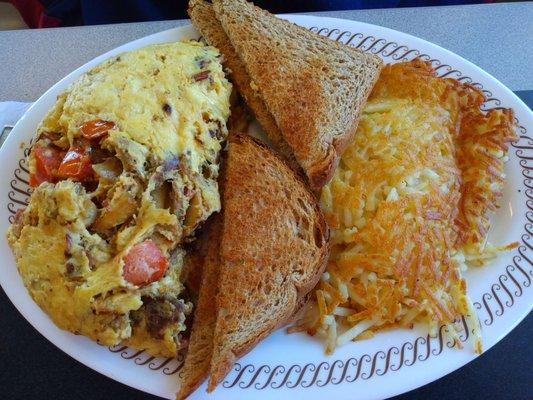 "Everything" omelet. Seriously, it had everything but jalapenos, wheat toast, hash browns.