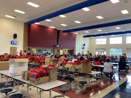 Sorting school supplies at McClintock Middle School for 8 Days of Service.