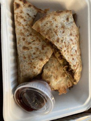 Brisket quesadilla with bbq sauce on the side