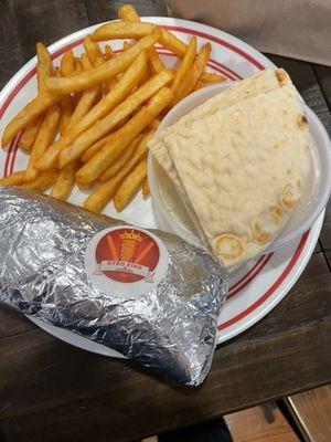 Wrapped gyro, fries, and hummus w/pita bread.