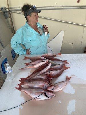 Wife with our haul of snapper.