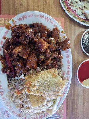 General Tso's chicken with ham fried rice, wonton cracker and fried shrimp. True American Chinese takeout here.