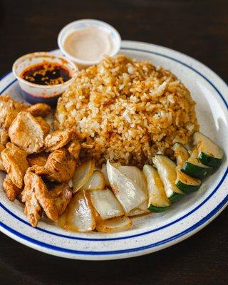 Chicken Teppan yaki
Chicken , zucchini & onion
Original Japanese BBQ sauce , white sauce and Fried rice.