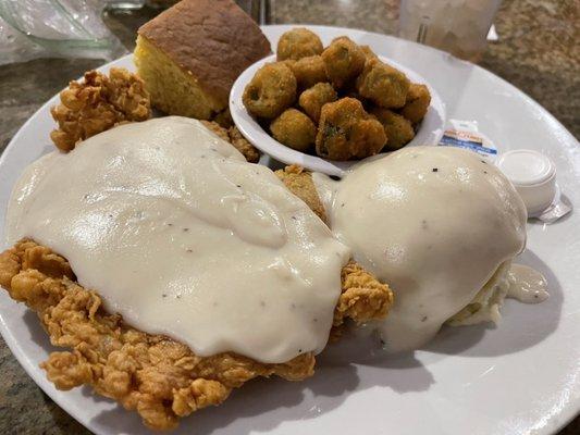 Chicken fried chicken with mashed potatoes, fried okra and corn bread! So yummy! Try the ranch, it's made in house!