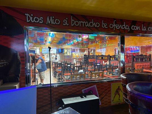 The window from bar area looking into fast food eatery side