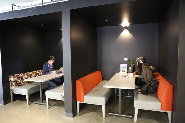 Huddle booths for private calls and meetings.