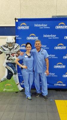 Father-daughter dentists volunteering at a TeamSmile event for kids in January.