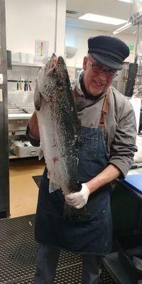 Chef Franck, getting ready to filet a BEAUTIFUL fresh salmon.  You can count on Bacquet's for the freshest seafood!