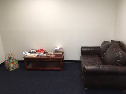 Small nook in the new office for kids to play while parents supervise