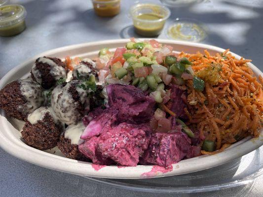 Falafels (plus beet salad, carrot salad and tomatoes cucumbers salad)