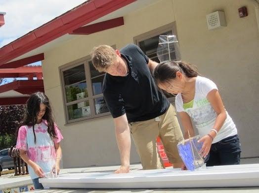 Campers are given a design challenge and use a design cycle of brainstorming, designing, evaluating, testing, and redesigning