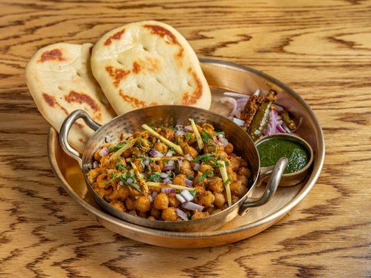 LOTAN KE CHOLE

masala chickpeas, kulcha bread. (chawri bazar's legendary lotan's chole, served in old Delhi for over a hundred years.)