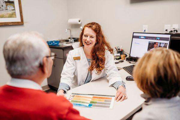 Dr. Susan talking with patients about treatment options