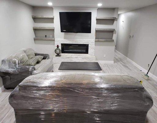 Picture of living room remodel with the Floating shelves!