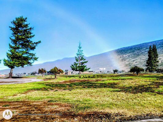 'Anuenue or a rainbow forms on the camping and picnic grounds on this Wednesday morning in November. 54 degrees, chilly + windy.