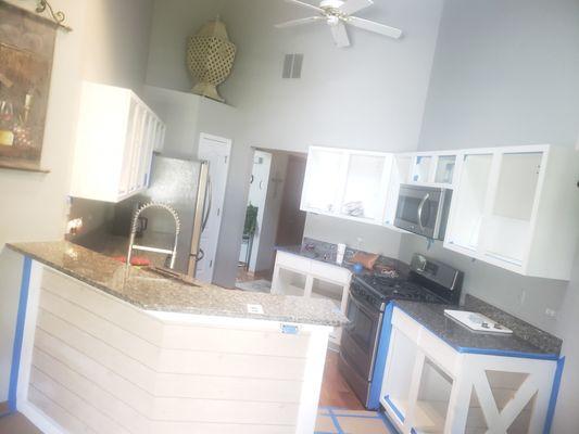 Behind the scenes work on remodeling this kitchen cabinets and breakfast nook area,