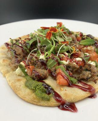 Lamb flatbread with micro greens