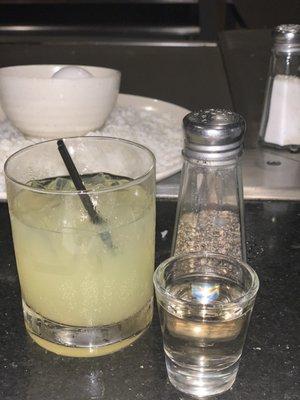 Teeney tiny margarita forgot the liquor so paid $6 more for a shot of tequila (pepper shaker for scale to size