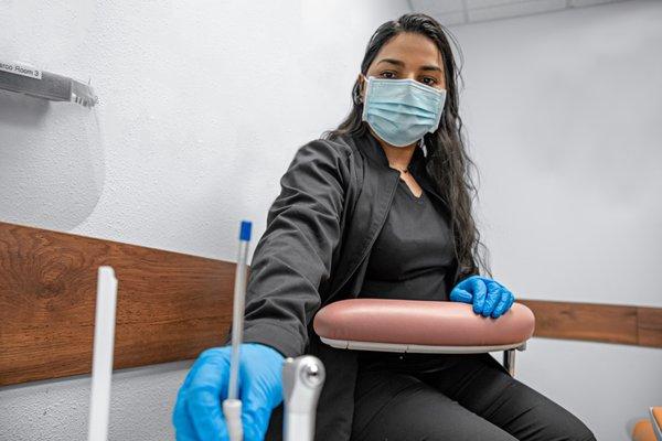 Bhima shows off one of our tools in the dental op.