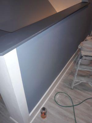 Hallway wall above staircase custom painted.