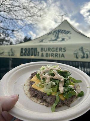 Smash burger taco by Bayou Burgers & Birria, delightful