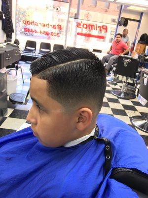 Kids comb over low fade to the skin