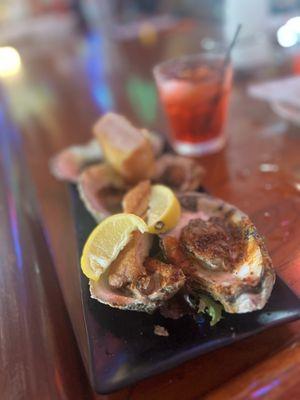 Blackened oysters. Severely overcooked and chewy making the seasoning just dry and powdery on top of a chewy oyster.