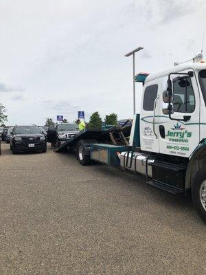 Unloading at the dealership.