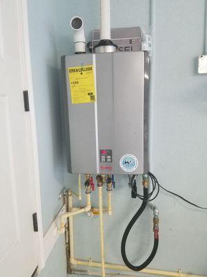 Indoor natural gas condensing tankless hot water heater