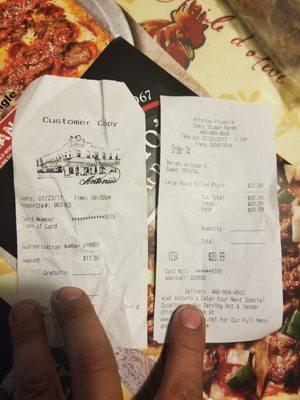 Receipt showing purchased pizza and salad with time date stamp.