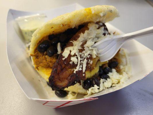 Shredded beef, black bean, plantain arepa