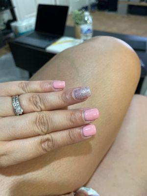 Pink gel manicure with silver glitter accent nail