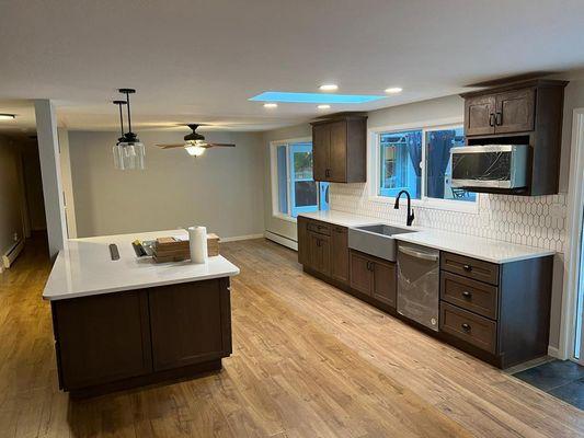 Modern kitchen with detached island , full tile backsplash