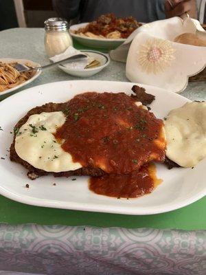 Oh, my God! Veal Parmigiana, amazing! (bread basket in the back)