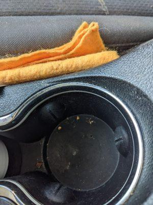 Trash left in cup holder