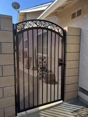 Single Gate with an arched on top and privacy screen ( deadbolt and Doorknob )