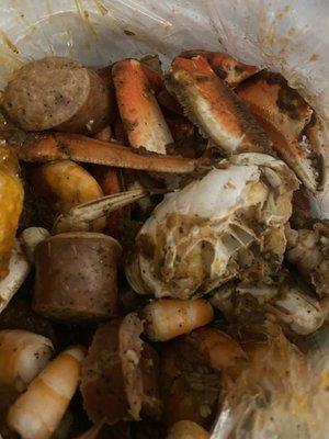 Build your Boil: 1/2lb each sausage, shrimp, snow crab and dungeonous crab w Bayou Mild seasoning.  DELICIOUS!!!