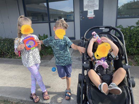 Happy kids with their prizes after great dentist appointments all done within an hour.