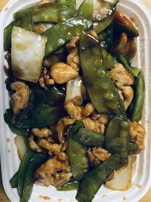 Chicken with peapods in the restaurant's carryout container. Ordered light sauce.