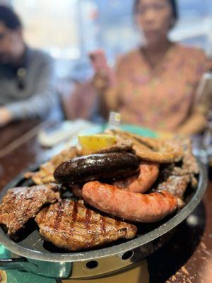 This plate of mixed bbq meats was amazing well seasoned !