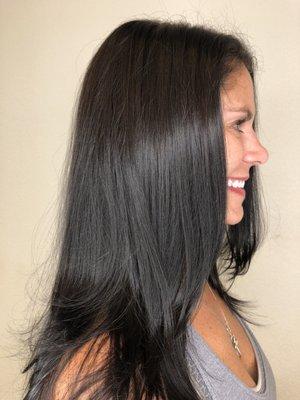 Dark shiny brunette hair color