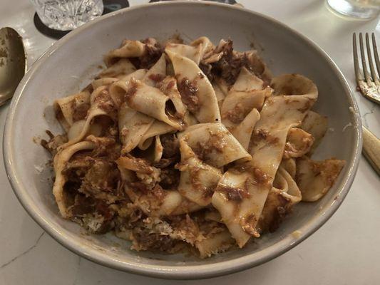 Pappardelle with braised short rib ragout after mixing cheese mountain into the dish.