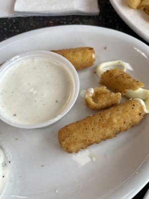 half eaten mozzarella sticks