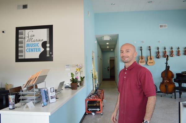 Co-owner, Mr. John, strolls through the halls of the new store.