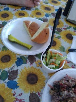 Coleslaw,  bread and a pickle.