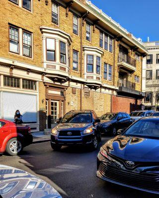 If you are not able to parallel park, do not park in the middle of the road to run in for your takeout order.