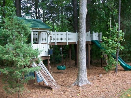 We really love this playset!  Loads of features including a 13' overhead bridge and an 8' x 10' deck surrounding two large pines