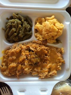 BBQ over rice with green beans and Mac and cheese